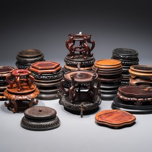 A collection of 40 mainly Chinese wooden stands, 19/20th C. — photo 1