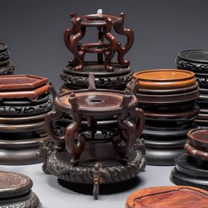A collection of 40 mainly Chinese wooden stands, 19/20th C. — photo 3