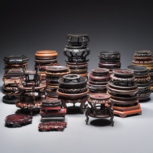 A collection of 70 Chinese wooden stands, 19/20th C. — photo 1