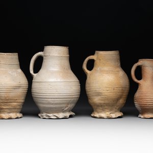 A collection of 8 German proto stoneware ribbed jugs, including 'Jacobakans', 14th C. — photo 9