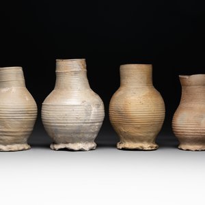 A collection of 8 German proto stoneware ribbed jugs, including 'Jacobakans', 14th C. — photo 10