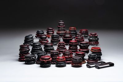 A collection of 80 Chinese wooden stands, 19/20th C.