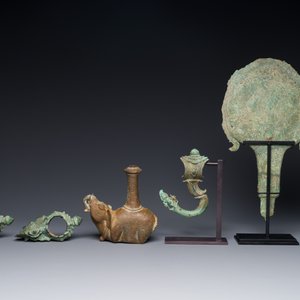 A collection of bronze sculptures, palanquin hooks and a candlestick holder, Cambodia, 13th C. and earlier — photo 3