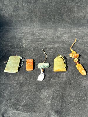 A collection of Chinese jade pendants, Qing — photo 1