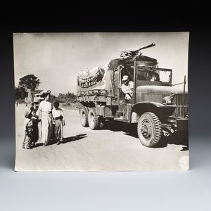 A collection of eight U.S. Signal Corps press photographs on the first China convoy over the Stilwell Road — photo 4