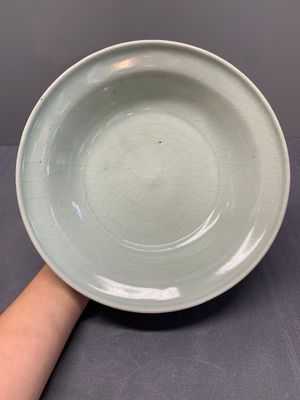 A collection of five Chinese celadon wares, Ming and later — photo 22