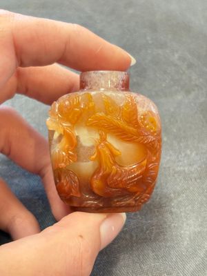 A collection of nine Chinese agate snuff bottles, 20th C. — photo 31