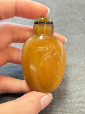 A collection of nine Chinese agate snuff bottles, 20th C. — photo 37