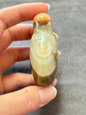 A collection of nine Chinese agate snuff bottles, 20th C. — photo 46