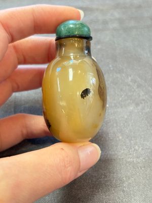 A collection of nine Chinese agate snuff bottles, 20th C. — photo 52