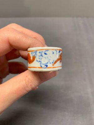 A collection of nine Chinese blue and white, monochrome and famille rose bird feeders, 19th C. — photo 37
