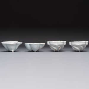 A collection of nine white-glazed Dutch Delft pudding moulds, a mustard pot and a two-handled strainer, 18th C. — foto 9