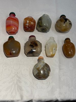 A collection of ten Chinese agate snuff bottles, 20th C. — photo 1