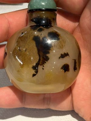 A collection of ten Chinese agate snuff bottles, 20th C. — photo 11
