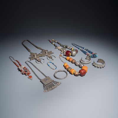 A collection of ten silver, metal, hardstone and bead-set jewellery, Asia and Africa, 19/20th C.