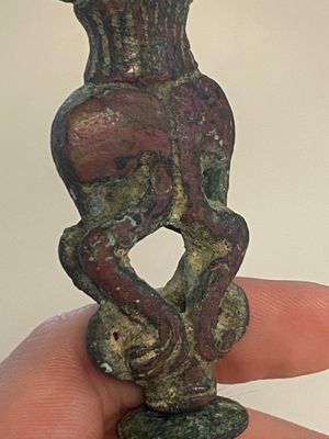 A collection of three bronze axes, a mirror and an anthropomorphic idol with two dragon heads, Luristan, 2000 B.C and earlier — 照片 11