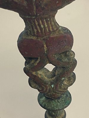 A collection of three bronze axes, a mirror and an anthropomorphic idol with two dragon heads, Luristan, 2000 B.C and earlier — 照片 13