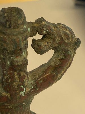 A collection of three bronze axes, a mirror and an anthropomorphic idol with two dragon heads, Luristan, 2000 B.C and earlier — 照片 10
