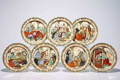 A complete series of seven Dutch-Decorated Leeds creamware "Sacraments" plates, 18th C.