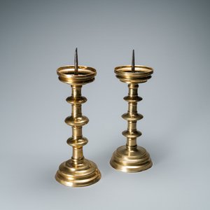 A composite pair of brass alloy candlesticks, Germany, 16th C. — photo 1