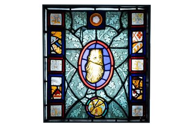 A composite stained and painted glass window mounted in lead alloy, England and/or France, 15th C. and later