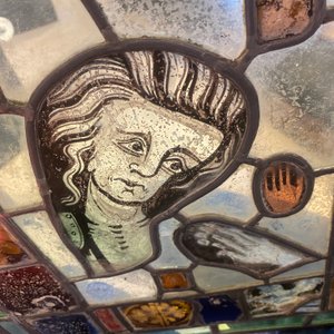 A composite stained and painted glass window mounted in lead alloy, France, 13th C. and later — photo 11