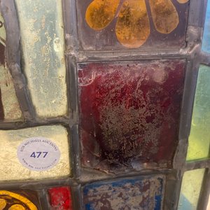 A composite stained and painted glass window mounted in lead alloy, France, 13th C. and later — photo 16