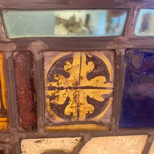 A composite stained and painted glass window mounted in lead alloy, France, 13th C. and later — photo 20