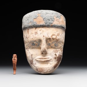 A death mask, a Ushabti, an oil lamp and a ritual cone with hieroglyphs, Egypt, 15th/1st C. B.C. — photo 2