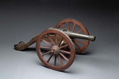 A Dutch bronze saluting cannon on a partly original carriage, inscribed C. Ouderogge Fecit, Rotterdam, dated 1641