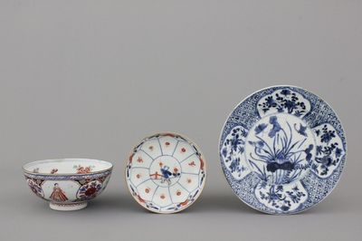 A Dutch-decorated Chinese porcelain orangist bowl and two Chinese porcelain plates, 18th C.