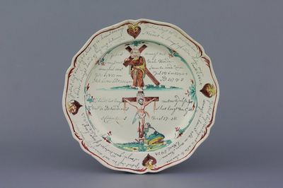 A Dutch-decorated English Leeds creamware plate with scenes from the life of Christ , 18th C.