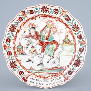 A Dutch-decorated Leeds creamware plate depicting "The flight into Egypt", 18th C. — 照片 1