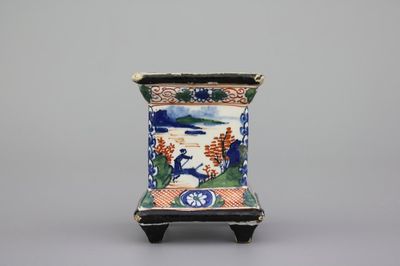 A Dutch Delft black-enhanced polychrome obelisk base, late 17th C.