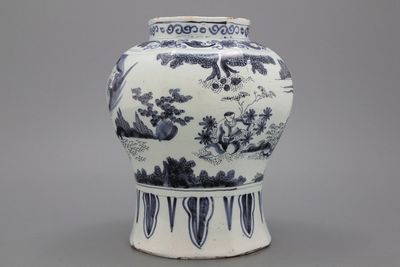 A Dutch Delft blue and white baluster vase in transitional style, late 17th C.