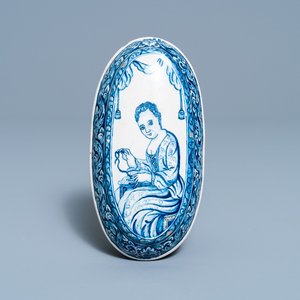 A Dutch Delft blue and white brush back with a seamstress at work, 18th C. — 照片 1