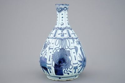 A Dutch Delft blue and white chinoiserie bottle vase, late 17th C.