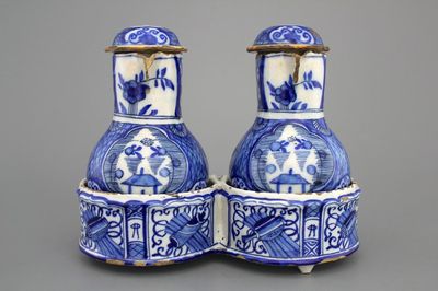A Dutch Delft blue and white chinoiserie cruet set, 18th C.