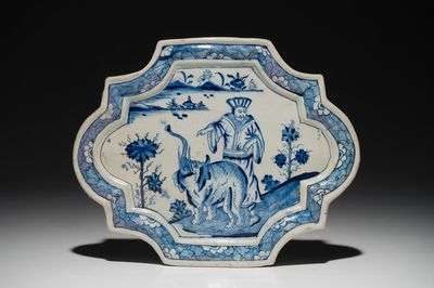 A Dutch Delft blue and white chinoiserie plaque with an elephant, 18th C.