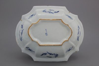 A Dutch Delft blue and white chinoiserie rectangular basin with ladies in a garden, ca. 1720