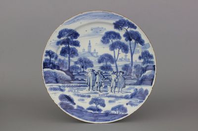 A Dutch Delft blue and white dish with a fine "open air" decoration, ca. 1720
