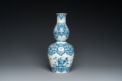 A Dutch Delft blue and white double gourd vase, 1st quarter 18th C.