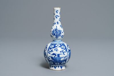A Dutch Delft blue and white double gourd vase with swans and chinoiserie, late 17th C.