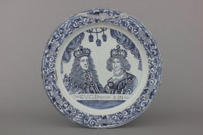 A Dutch Delft blue and white double royal portrait dish, late 17th C.