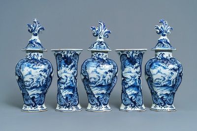 A Dutch Delft blue and white five-piece garniture with pastoral design, 18th C.