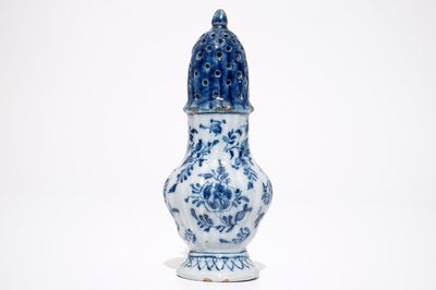 A Dutch Delft blue and white floral caster, 18th C.