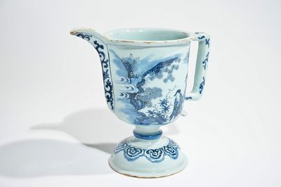 A Dutch Delft blue and white helmet-shaped ewer, 2nd half 17th C.