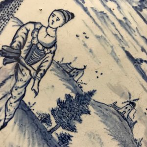 A Dutch Delft blue and white plaque with a lady in a landscape, 18th C. — 照片 8