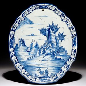 A Dutch Delft blue and white plaque with a pastoral scene, 18th C. — photo 1