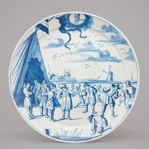 A Dutch Delft blue and white plate with skaters from the 'Zodiac' month series, early 18th C. — 照片 1